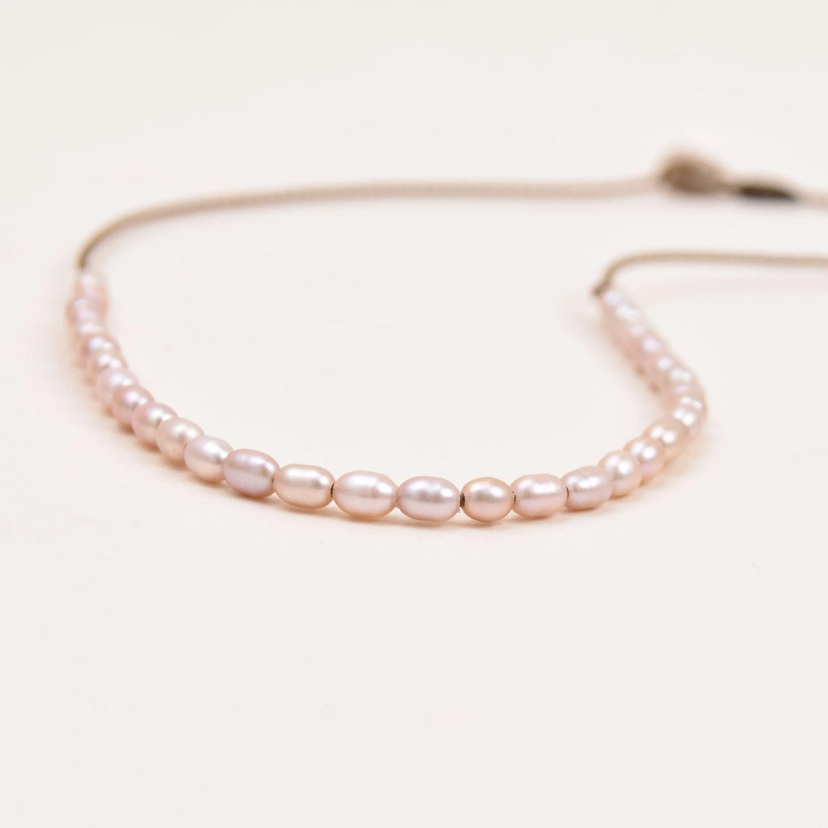 rice pearl crown necklace layout with white background