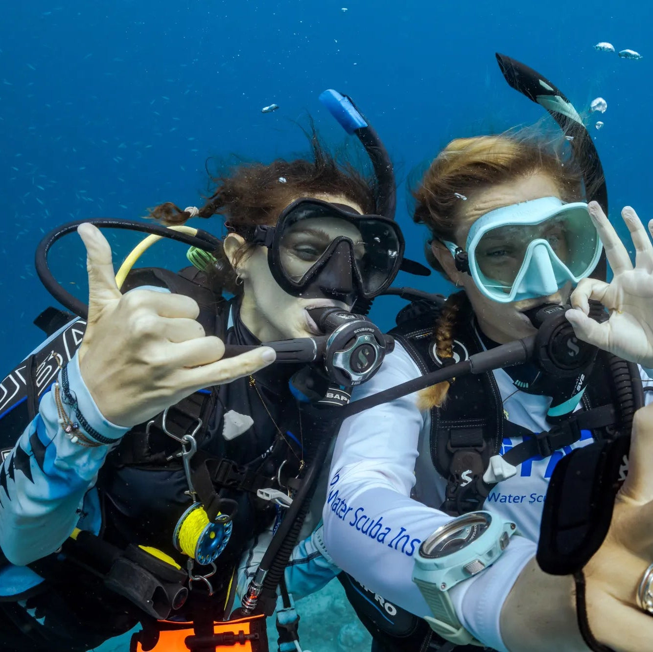 Seven Seas bracelet on PADI Scuba Divers under the water with scuba gear on