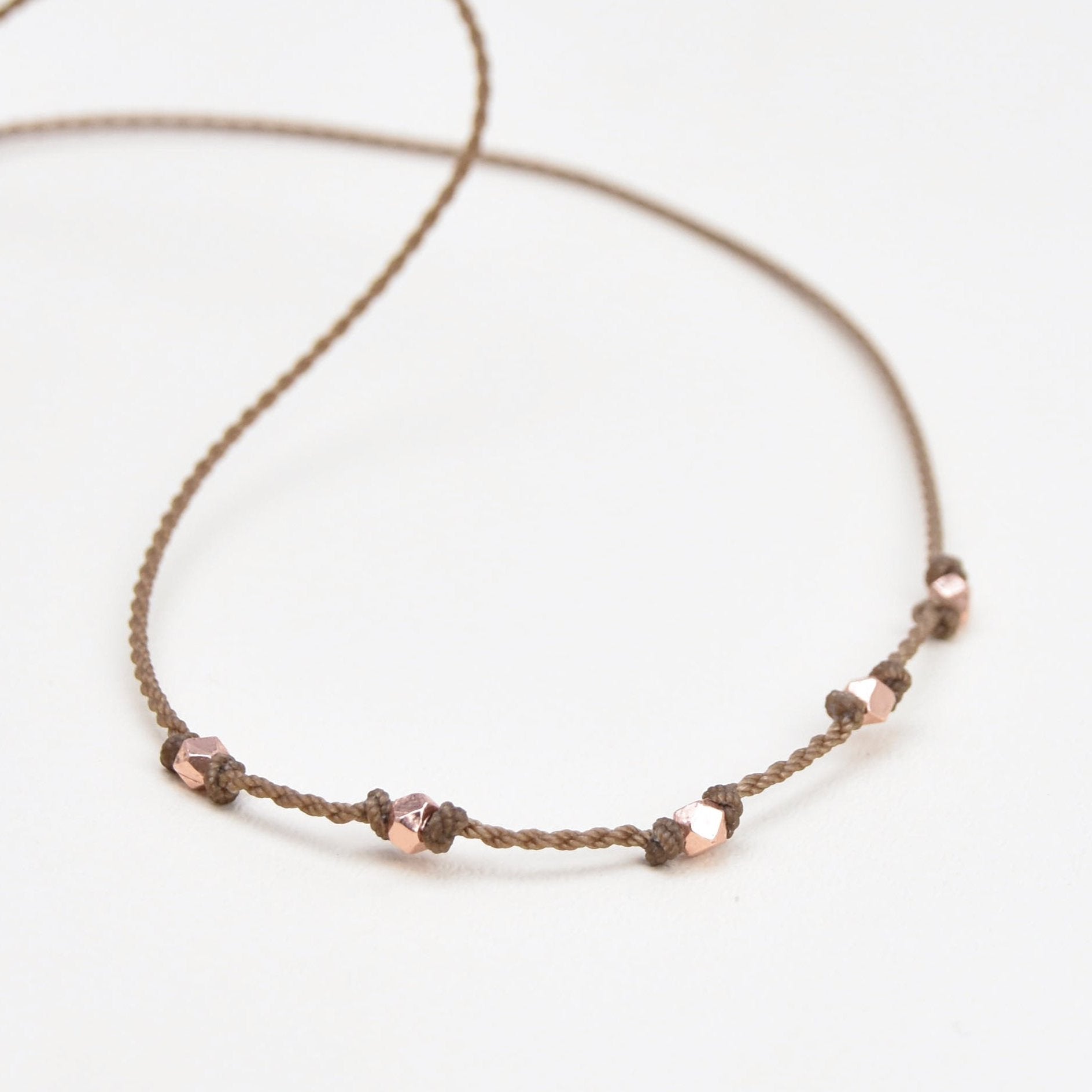 Quinn-1920-Rose Gold Faceted Tiny