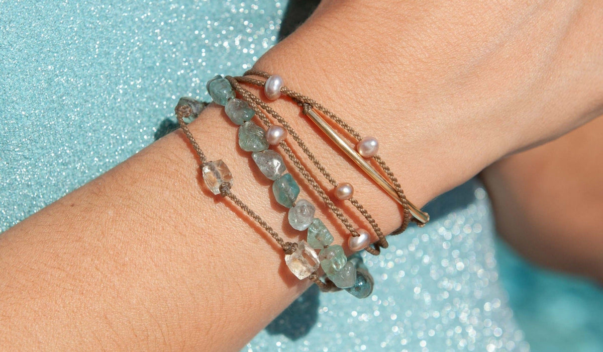 Metal-free hypoallergenic rope bracelet stack, close-up on wrist