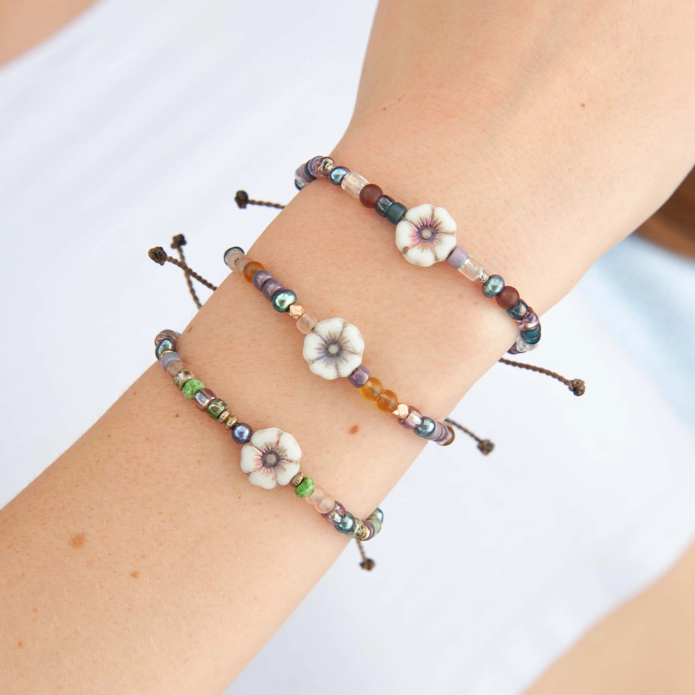 Czech glass hibiscus flower waterproof rope bracelet by Tula Blue