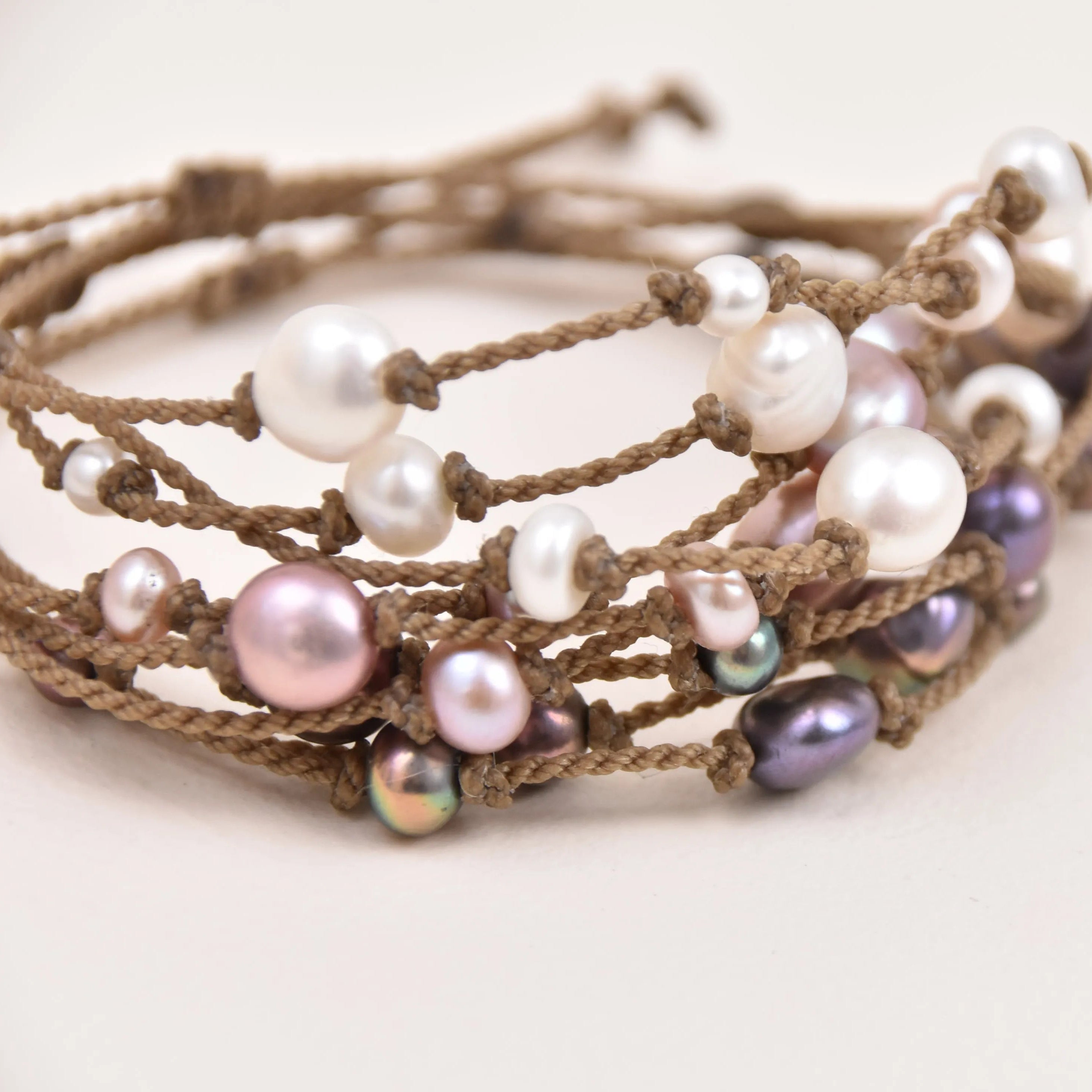 Tula Blue's Journey Bracelet in white blush and peacock stacked