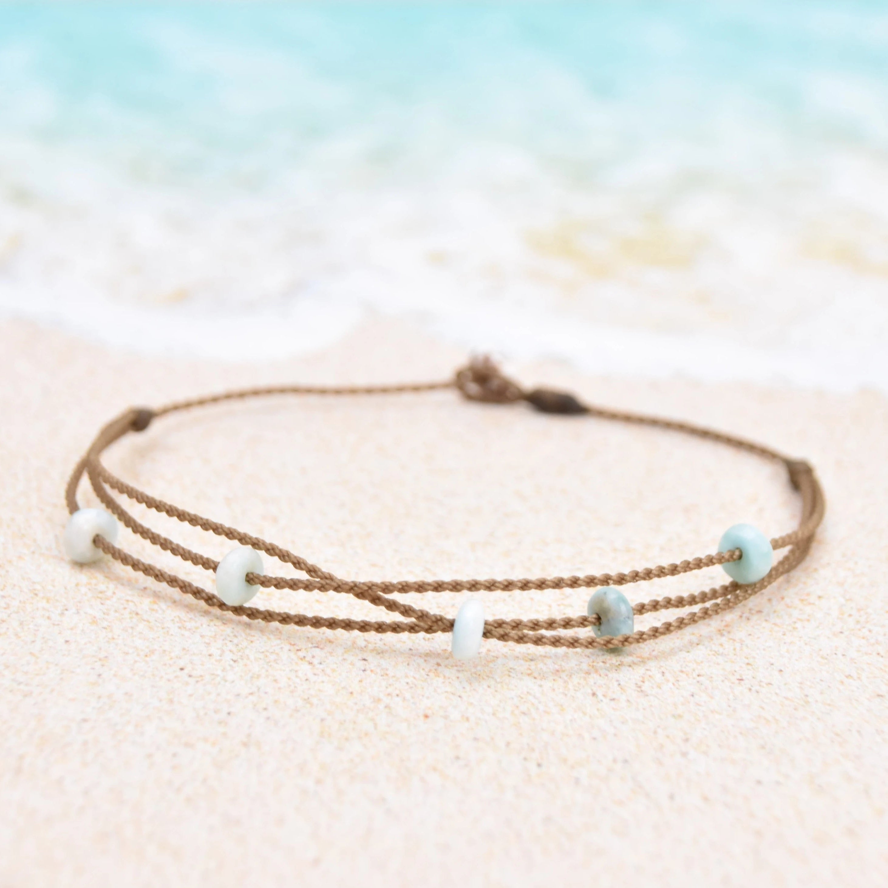 Tula Blue's waterproof Riptide anklet in larimar stones. All the drama of a stack in one perfect anklet.