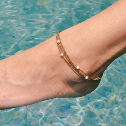 Tula Blue white pearl riptide anklet is waterproof and summer ready. All the drama of a stack in one perfect anklet. 