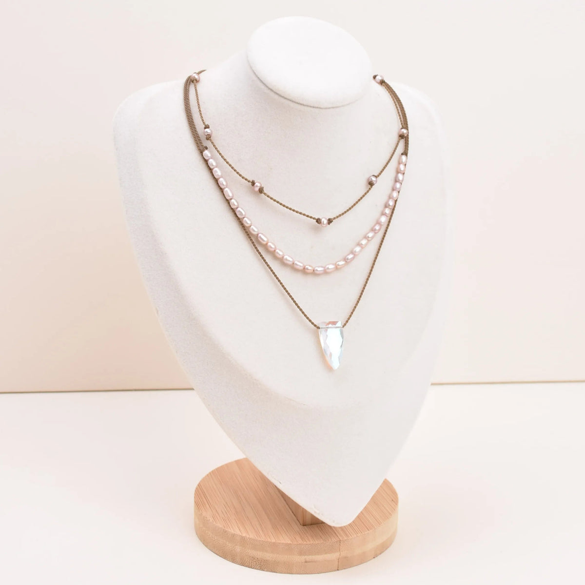 Rosy Aura Necklace Stack in blush on bust with white background