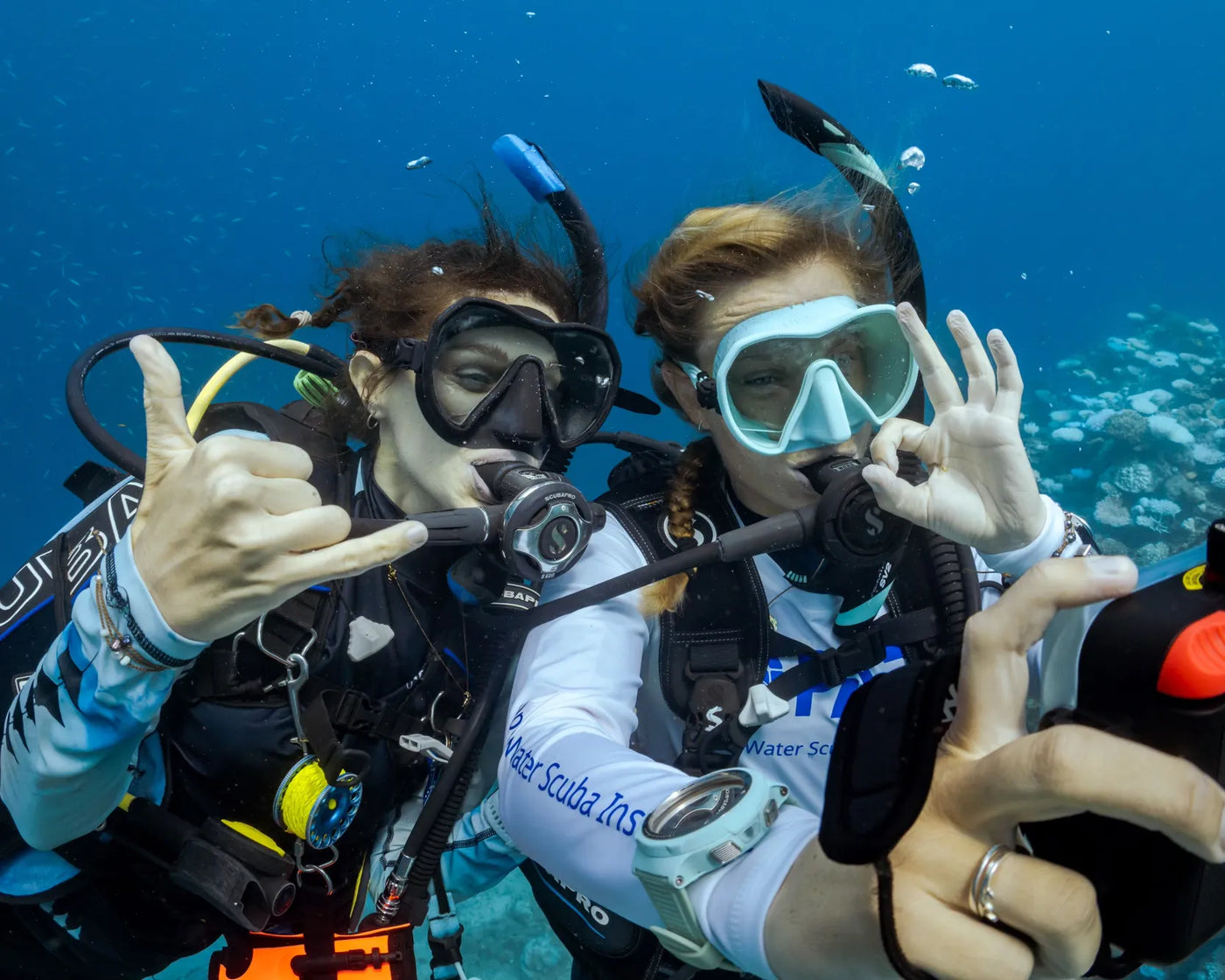 Seven Seas bracelet on PADI Scuba Divers under the water with scuba gear on
