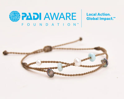Seven Seas X PADI Riptide Bracelet with white central pearl on white background