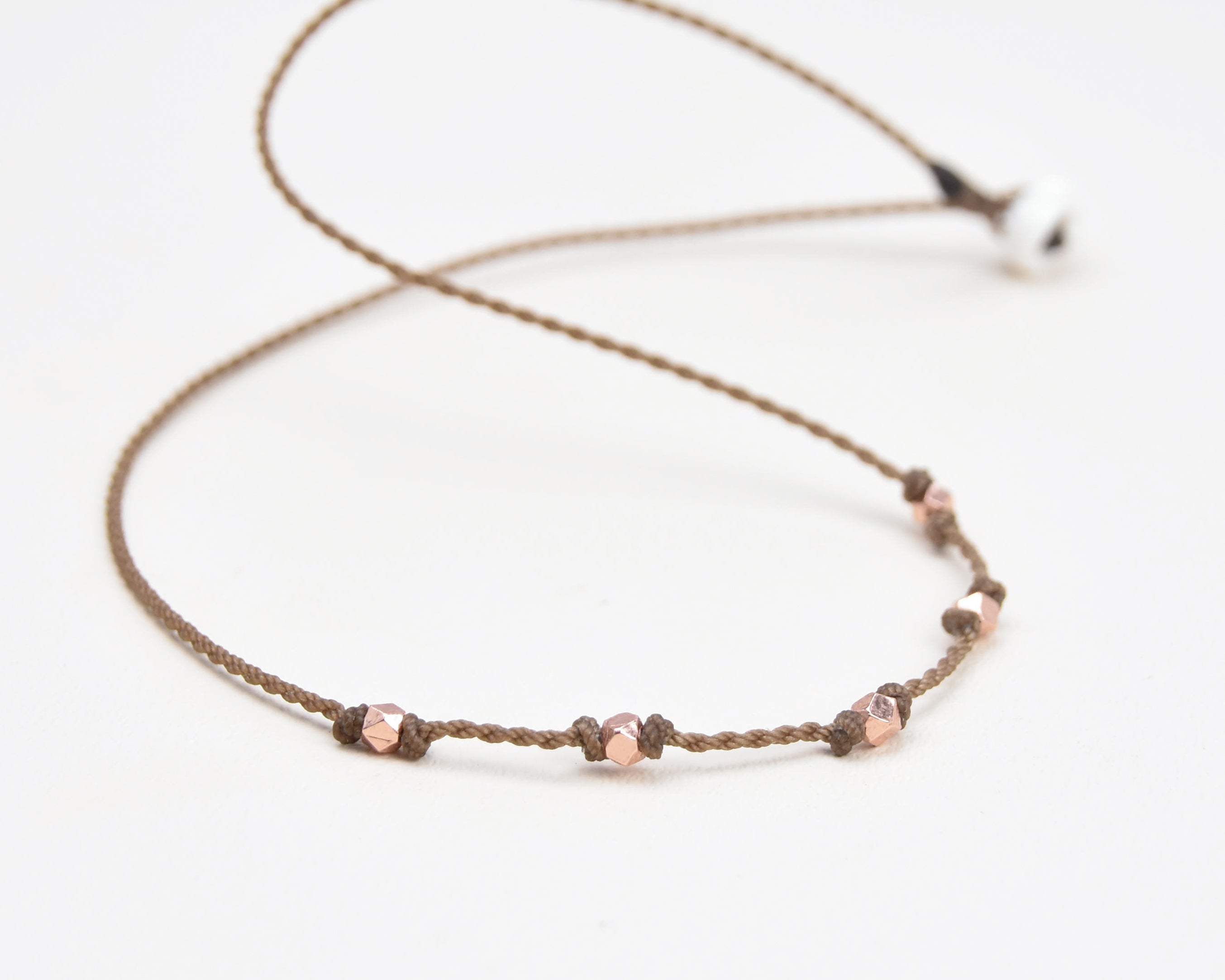 Quinn-1920-Rose Gold Faceted Tiny